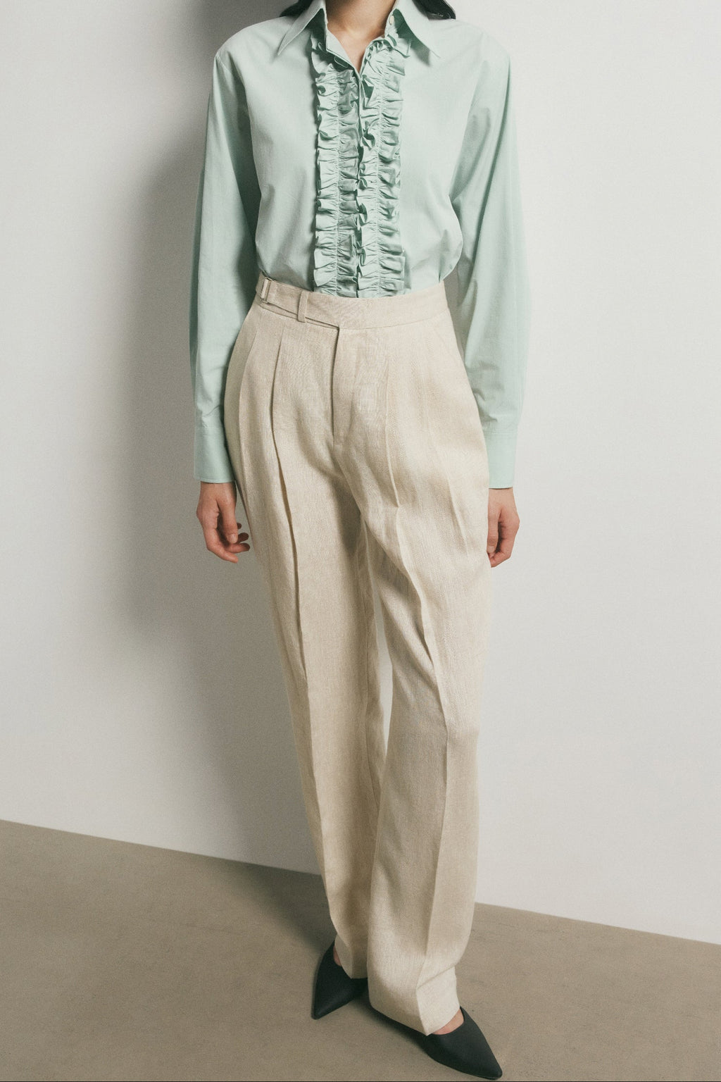 Pantalones plisados